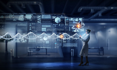 Woman doctor use tablet . Mixed media