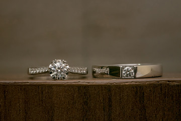 Diamond wedding ring in smoke background