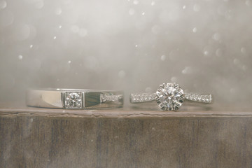 Diamond wedding ring in smoke background