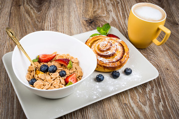 Photo of healthy breakfast on wooden background