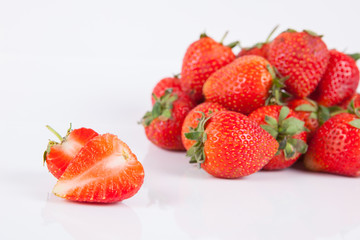 Strawberries berry close up on white background