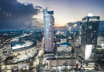 Warsaw,Poland October 2016:Warsaw city with skyscrapers at night - obrazy, fototapety, plakaty