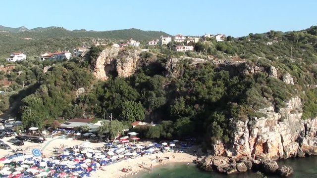 BUYUK CAKIL BEACH, KAS, TURKEY &ndash; August 20, 2013: Village on mountain and beach below, audio
