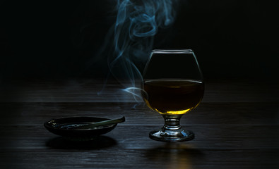 Pleasant evening! Cognac and cigarette