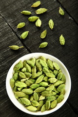 Bowl of fresh green cardamom 