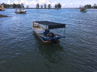 Fototapeta premium boat waiting a passenger at the harbour