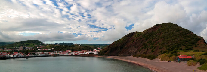 Sunset view to Horta, Porto Pim Bay and beach from mount Guia on Faial island, Azores, Portugal