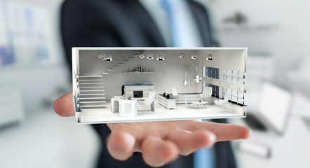 Businessman holding white 3D rendering apartment