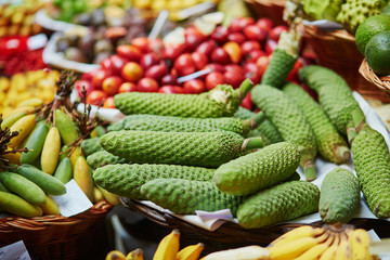 Exotic fruit of monstera deliciosa on market Mercado dos Lavradores, Madeira island, Portugal © Ekaterina Pokrovsky