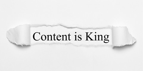 Content is King on white torn paper
