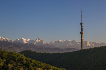 Fototapeta premium Kok Tobe hill and mountains view in spring, Almaty, Kazakhstan