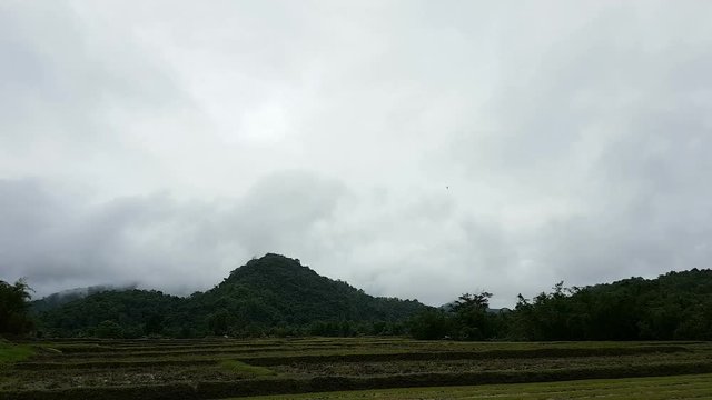 time lapse clouds on the mountains before raining