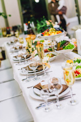 Beautiful table set for some festive event, party or wedding reception