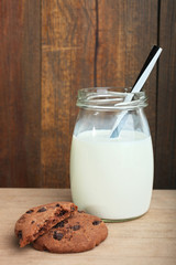 Jar with milk and cookies