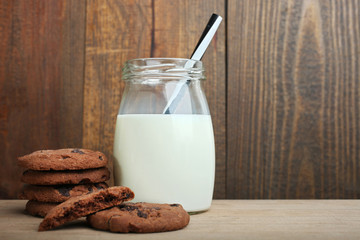 Jar with milk and cookies