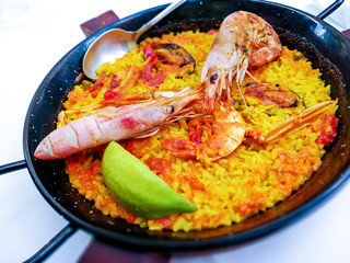 Prawn with rice - closeup of prawn with rice - traditionnal spanish food paella