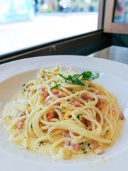 tasty Carbonara pasta on the table