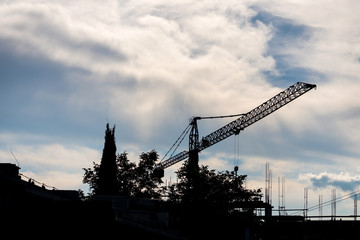 Industrial cranes working on a construction site
