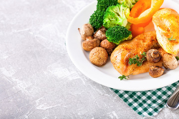 Healthy lunch - chicken fillet, mushrooms, broccoli and paprika. Selective focus. Copy space