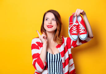 Woman with red gumshoes