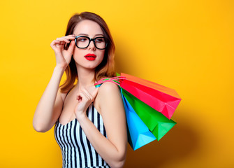 Woman with colour shopping bags