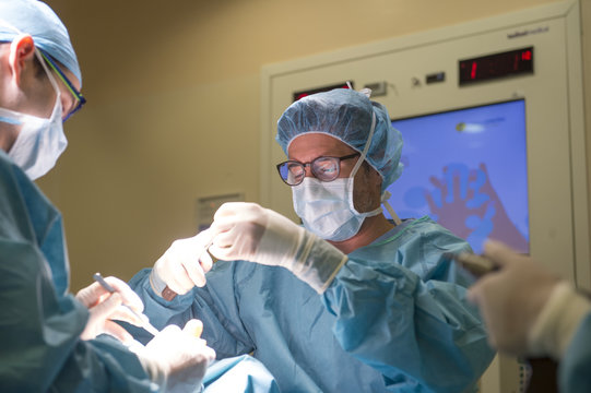 Doctors Doing Surgery In Operation Room