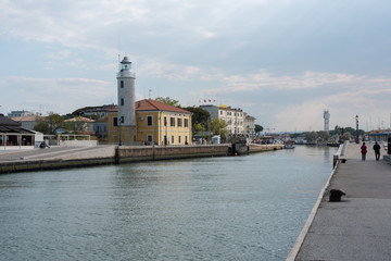 Lighthouse in the canal harbor of Cesenatico. Romagna coast