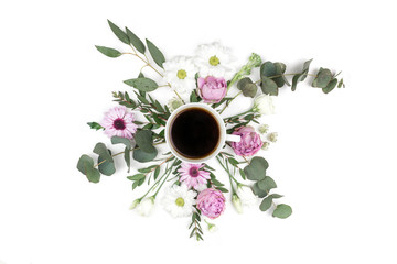 Black coffee mug, pink roses and white bouquet of chrysanthemum and eucalyptus flowers on a white background. Flat lay, top view