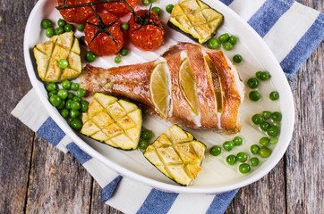 Baked fish with vegetables