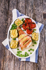 Baked fish with vegetables