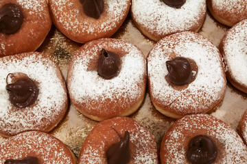 sweet cream filled donuts for sale in the pastry shop