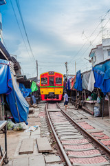 Naklejka premium the train pass inside the fresh market