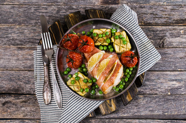 Baked fish with vegetables