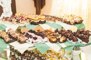 Buffet with a variety of delicious sweets, food ideas, celebration