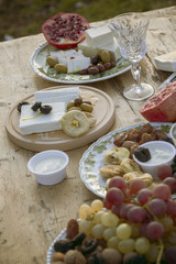 Appetizer with cheese, fruit and nuts