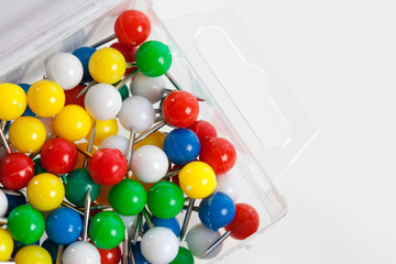 colorful color push pins isolated on white background