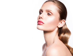 Beauty portrait of model with natural make-up. Fashion shiny highlighter on skin, sexy gloss lips...