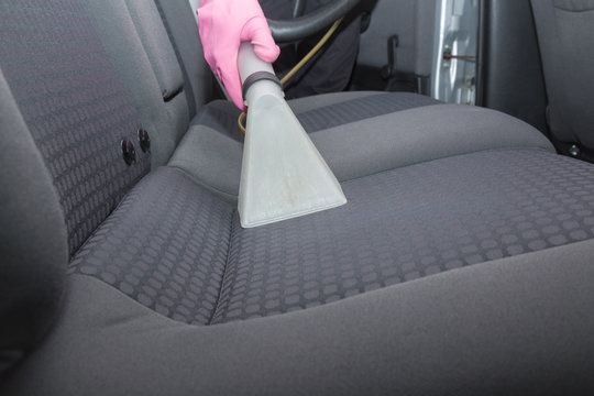 Car Interior Textile Seats Chemical Cleaning With Professionally Extraction Method. Early Spring Cleaning Or Regular Clean Up.