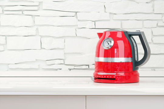 Red kettle in table kitchen room interior