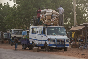 bush taxi Mali, traditional economic and transport in Africa where overloading of vehicles 