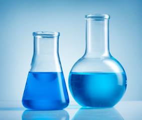 Laboratory glassware with blue liquid
