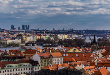 Fototapeta na wymiar View from above from the observation platform of the royal castle Hradcany on the old streets. Area of the Old City. Prague, Czech Republic.