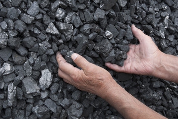 Hands of coal miner