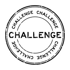Grunge black challenge round rubber seal stamp on white background