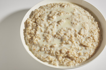 a bowl of cooked organic, pinhead, oatmeal