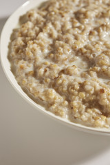 a bowl of cooked organic, pinhead, oatmeal