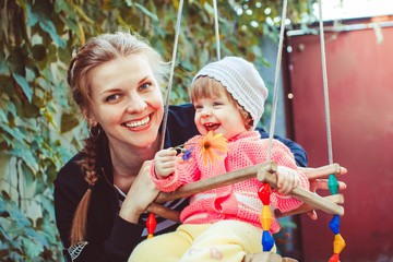 Obraz premium Child on the swing