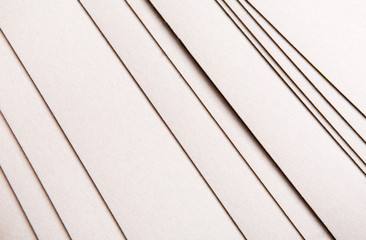Paper sheets stack close up, abstract background