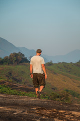 Naklejka premium Hiker on the top of the mountain.