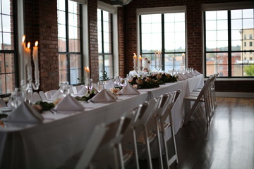 Industrial Loft with Brick Walls Decorated for Wedding Reception